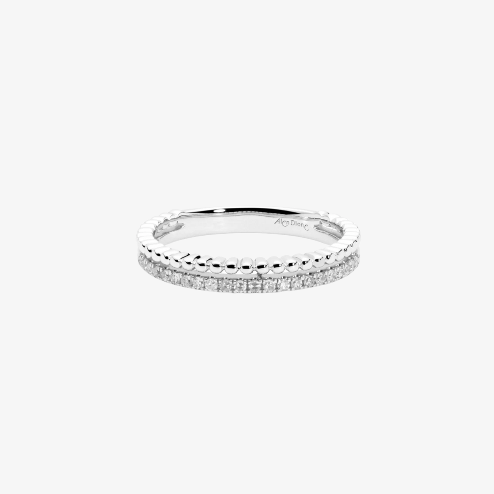 Fine white gold ring with a row of diamonds by Suïssa Joïers, elegant and minimalist design.