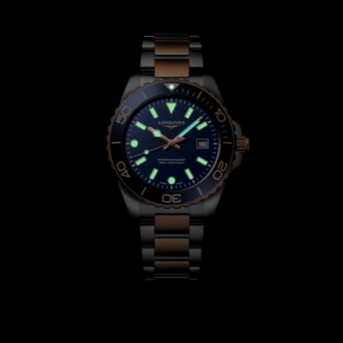 Longines HydroConquest Quartz 42 mm amb Esfera Blava Arenada, Agulles Rosa i Acer amb PVD Vermell